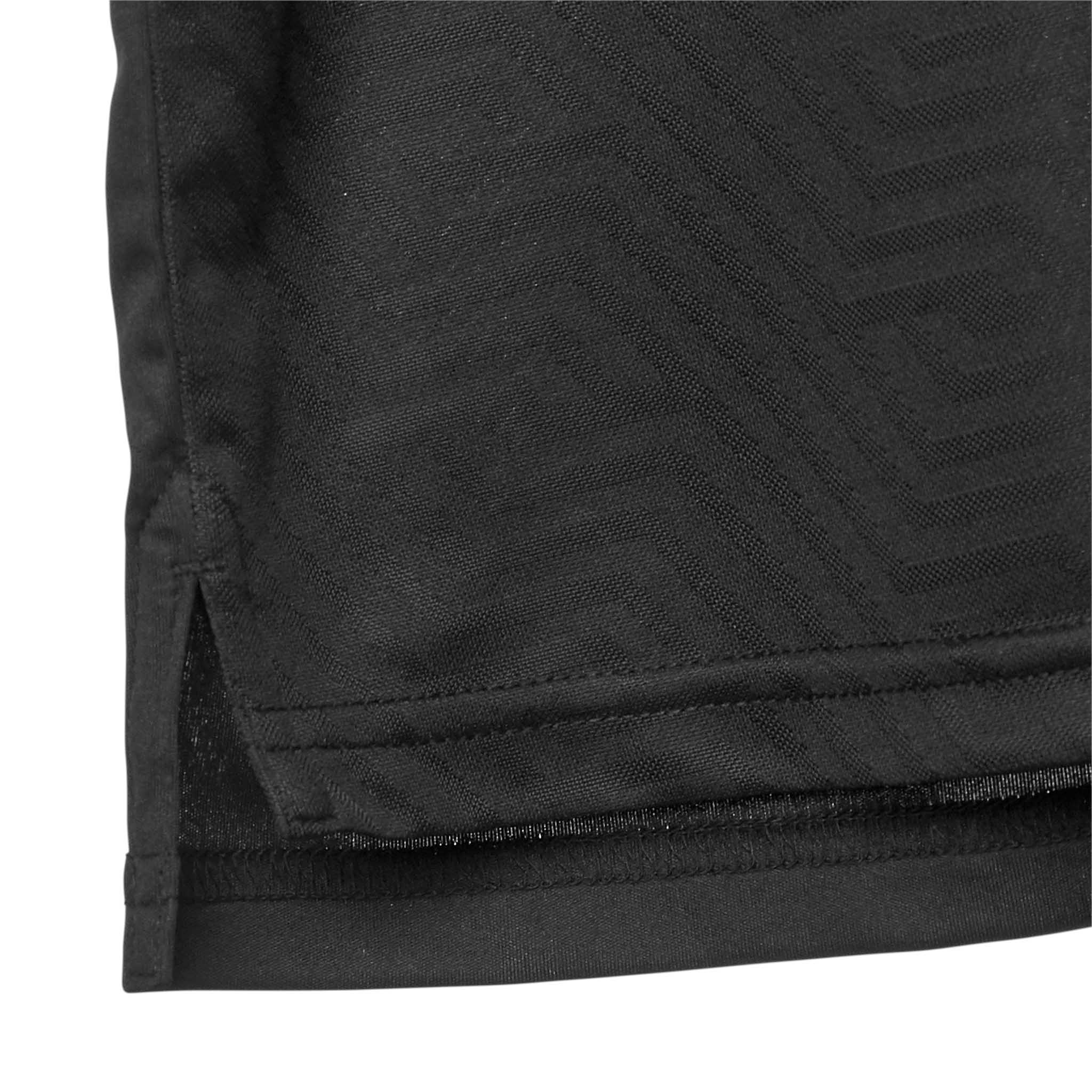 Nærbillede af sort Player shirt S/S Monaco v24 Match & Training wear, der viser kant og struktureret stof.