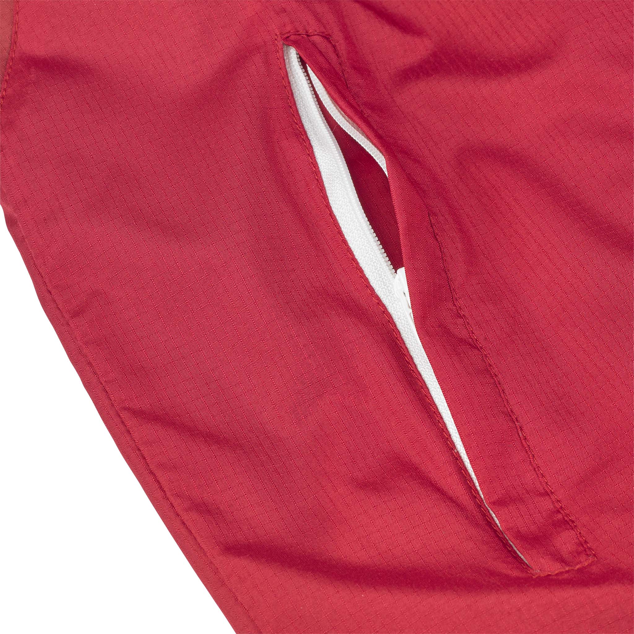 Nærbillede af rød Training jacket Spain v25, Match & Training wear, med hvidforet lynlåslomme