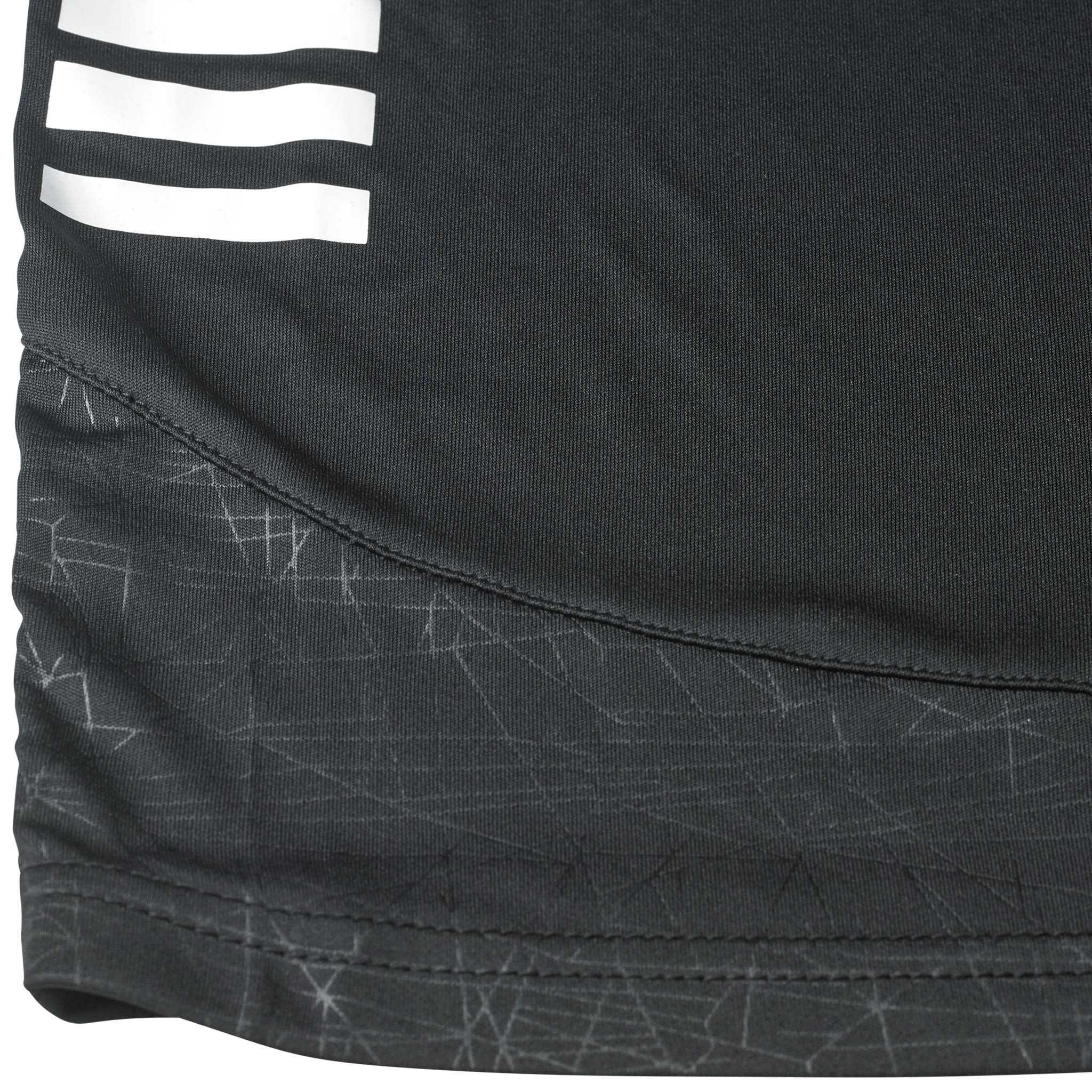 Nærbillede af Player shorts Spain v25, Match & Training wear, sort stof med hvide striber og gråt mønster.