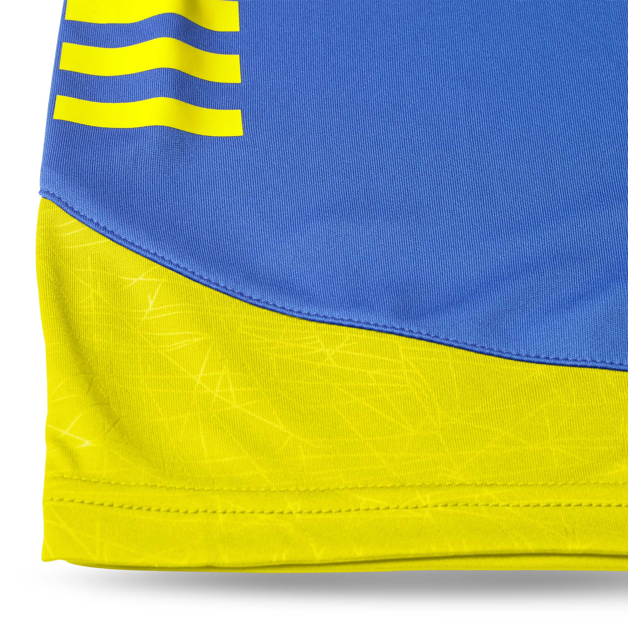 Nærbillede af Player shorts Spain woman v25, Match & Training wear, blåt og gult stof med struktureret detalje